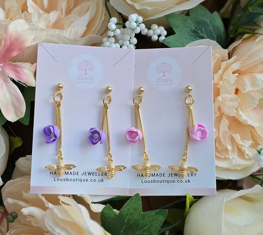 Handmade 14k gold bee and pink or purple polymer clay flower dangle drop whimsical earrings | summer statement earrings | light weight | gift for her